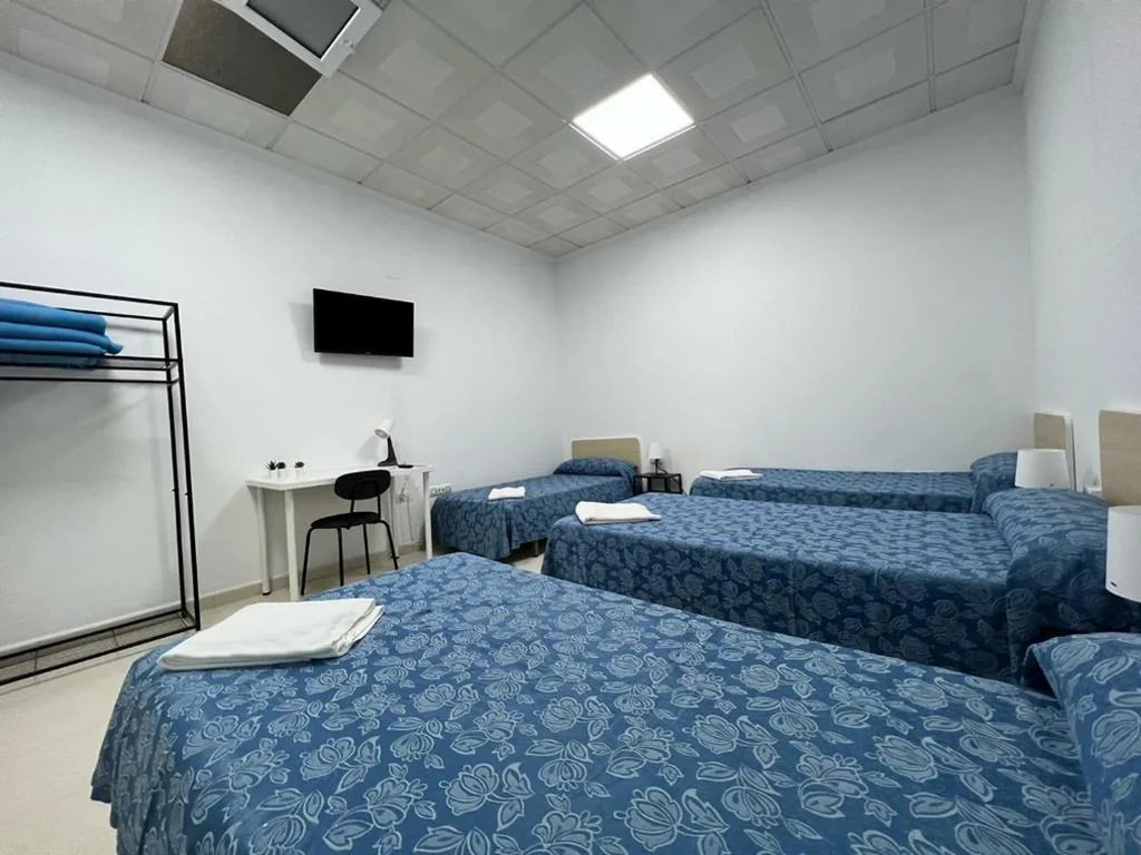 Dreibettzimmer — Hostal Kaizen