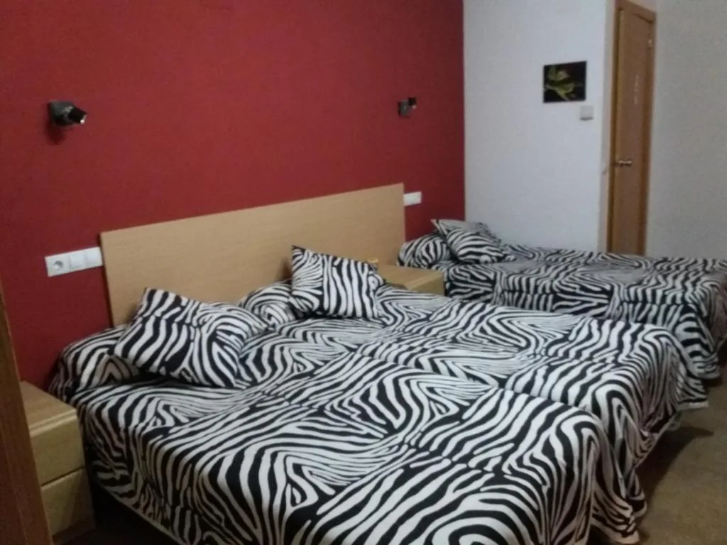 Habitación Triple — Hostal la Catedral