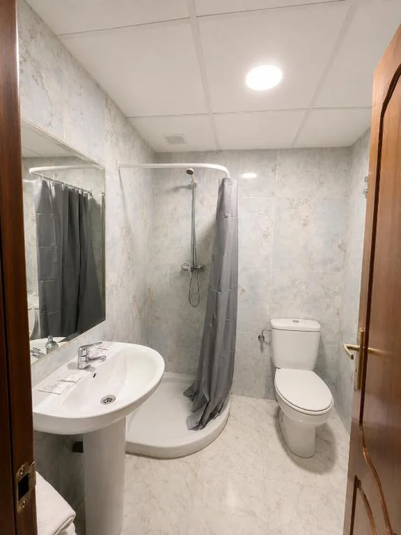 Habitación Individual — Hostal la Embajada