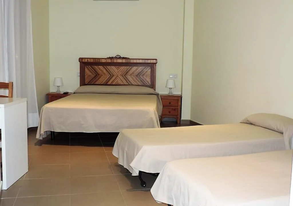 Habitación cuádruple — Hostal La Placeta