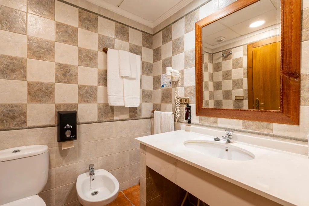 Standard Quadruple Room — Hostal La Posada
