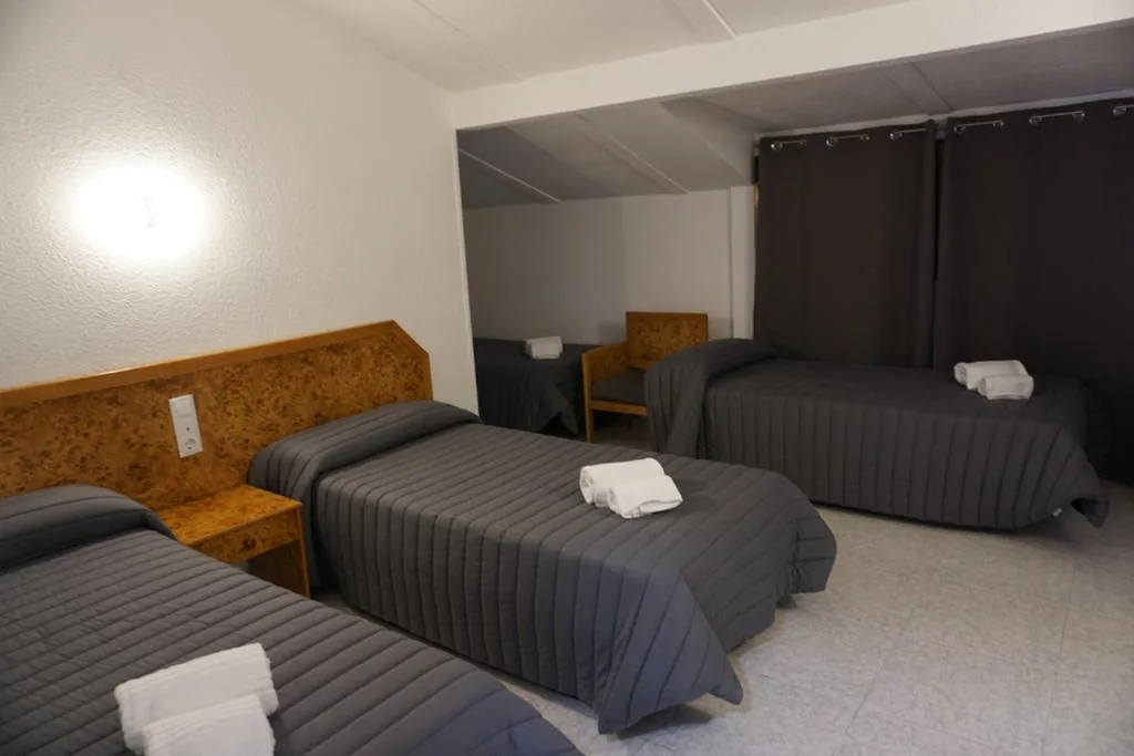 Vierbettzimmer — Hostal La Reserva