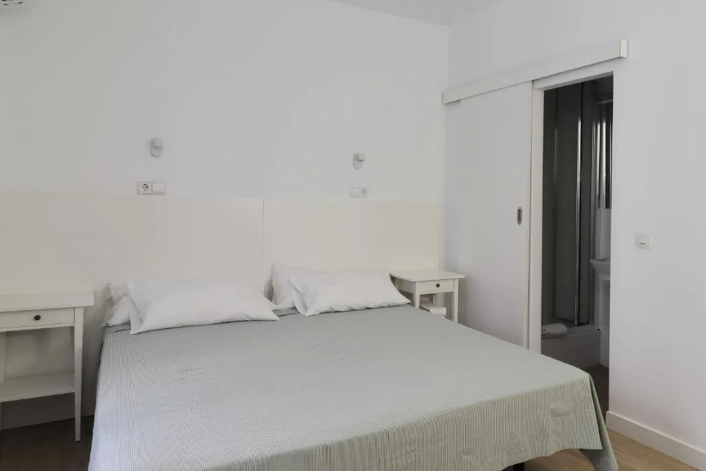 Grote tweepersoonskamer — Hostal La Zona