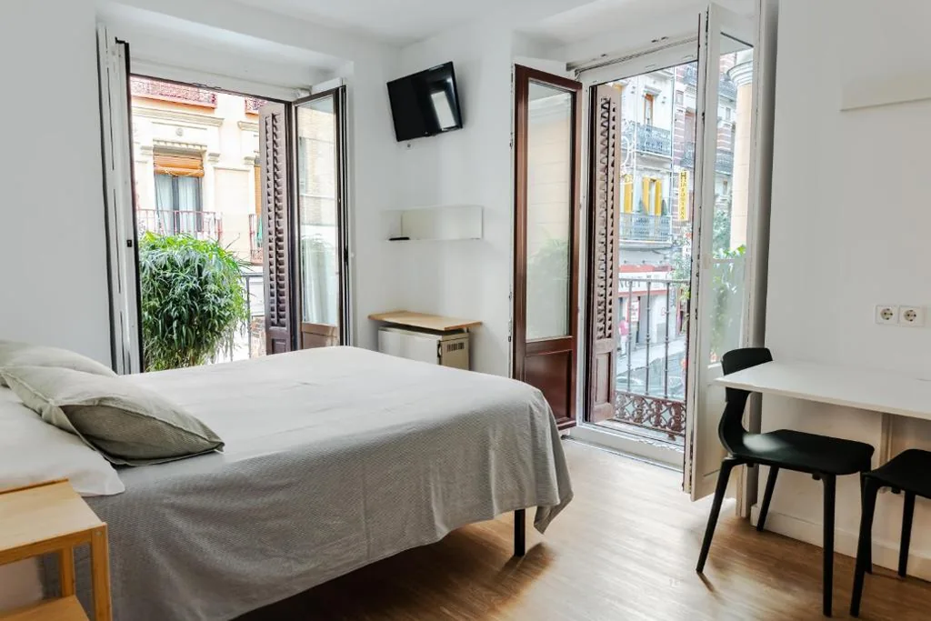 Grote tweepersoonskamer — Hostal La Zona