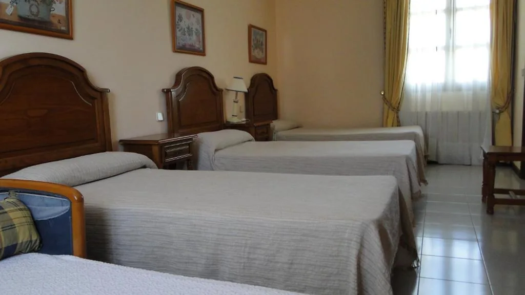 Quarto Quádruplo Clássico — Hostal Las Paneras