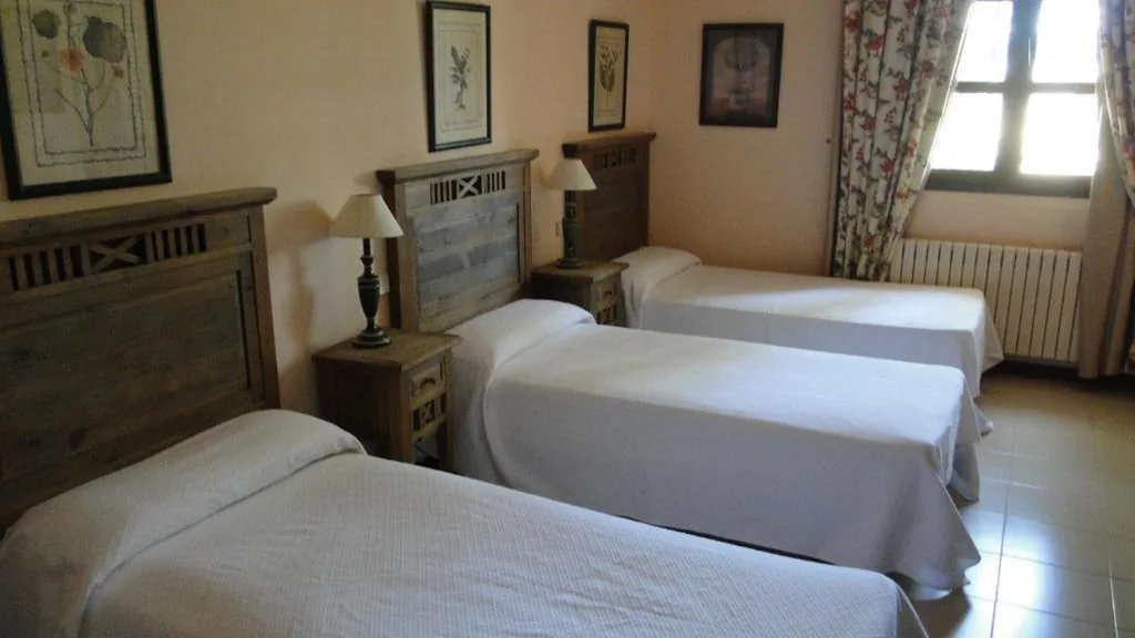 Quarto Triplo — Hostal Las Paneras