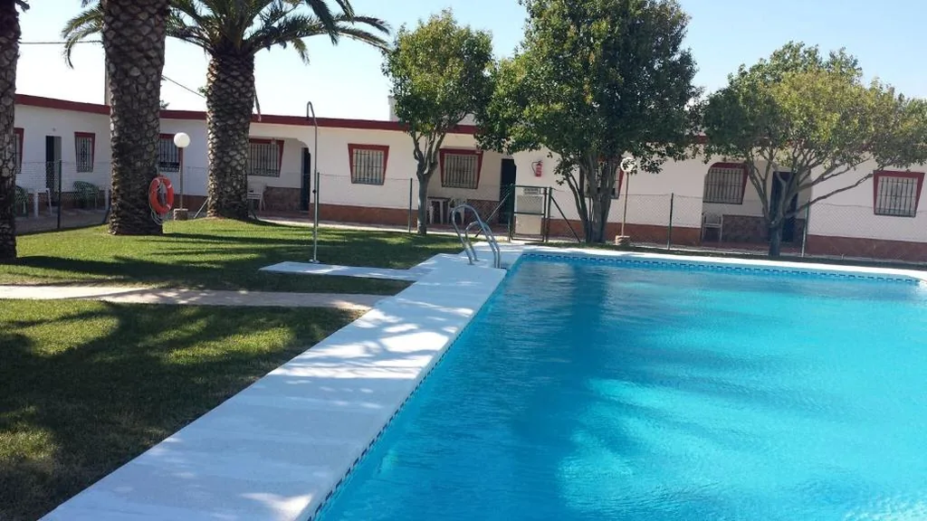 Habitación Triple Básica — Hostal las Parcelas