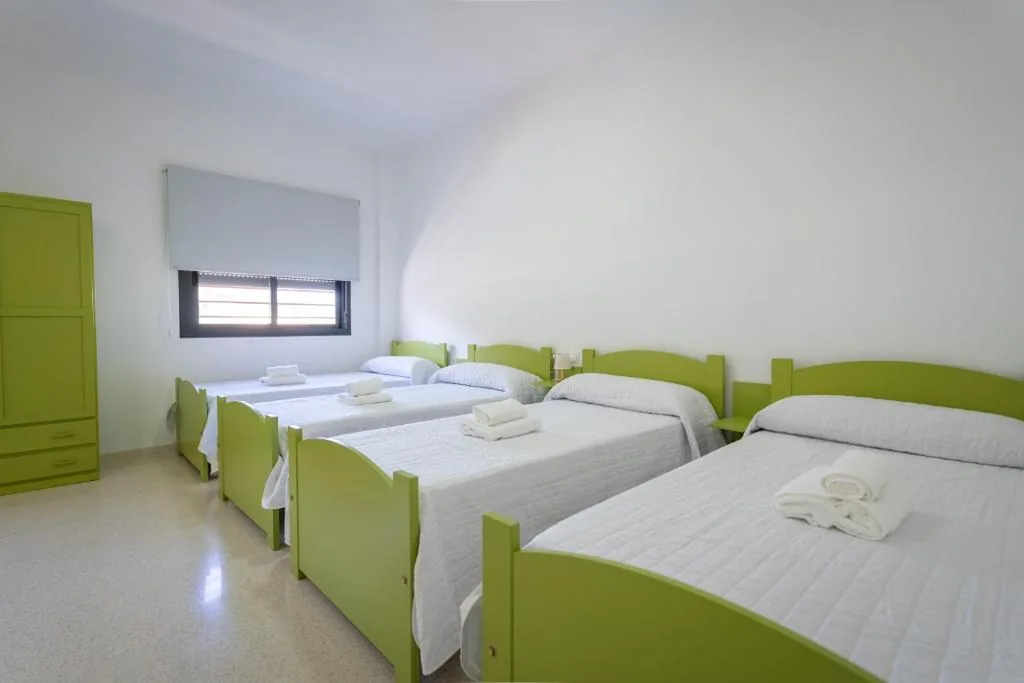 Habitación cuádruple — Hostal Las Viñas