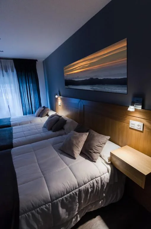 Dreibettzimmer — Hostal Libertad