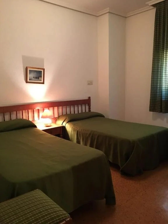 Quarto Triplo — Hostal Los Chopos