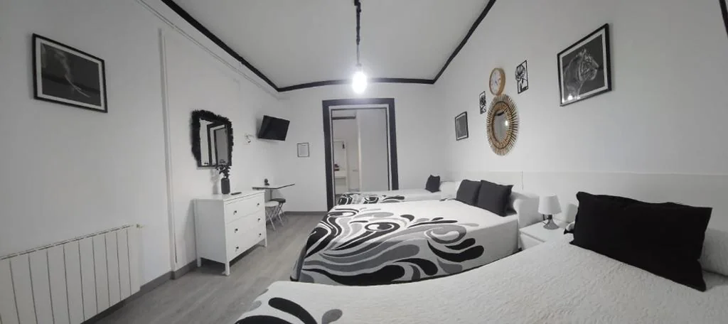 Quarto Quádruplo — Hostal Loyola