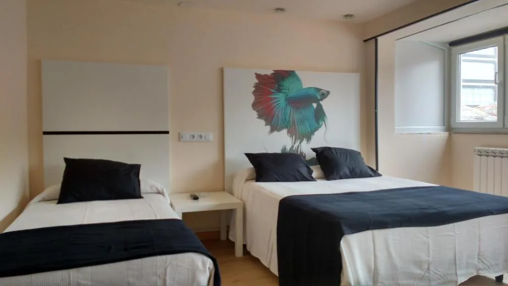 Budget Quadruple Room — Hostal Mara