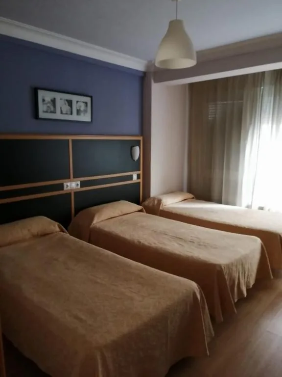Triple Room — Hostal Mara