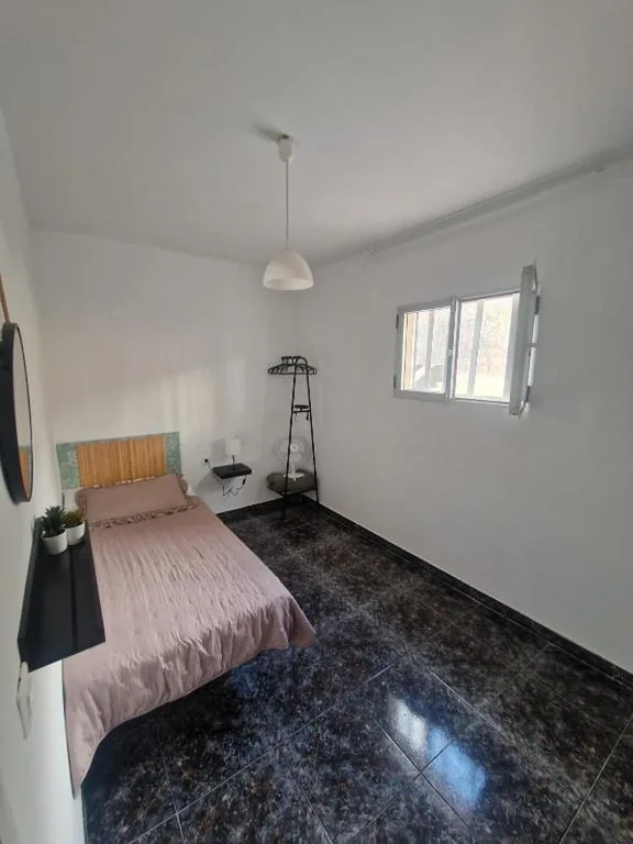 Chambre individuelle avec salle de bains commune — Hostal Maxorata