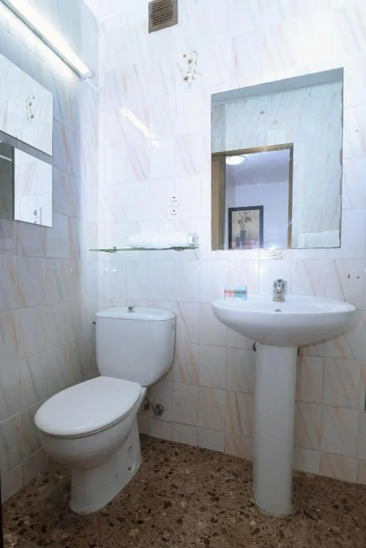 Quarto Triplo — Hostal Milmarcos