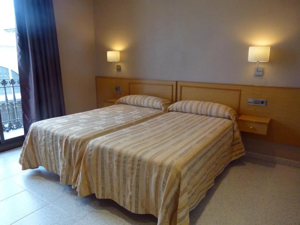 Doppelzimmer mit gemeinschaftlich genutztem Bad – 1 oder 2 Betten — Hostal Nuevo Colon