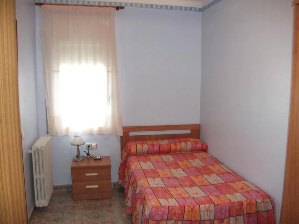 Habitación Individual — Hostal Oasis