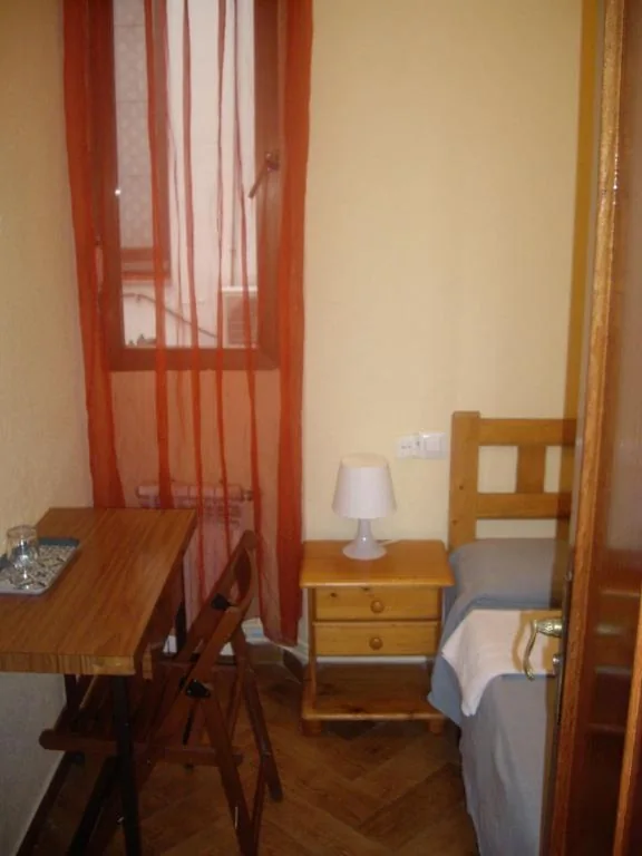 Eenpersoonskamer met gedeelde badkamer — Hostal Pacios