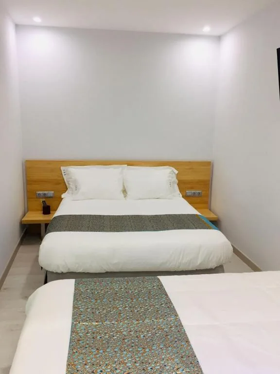 Triple Deluxe — Hostal Palacio Luna