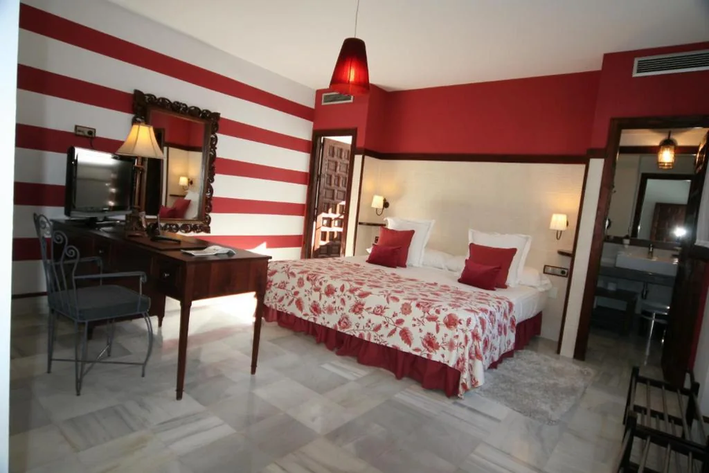 Junior Suite (3 adulti) — Hostal Palacio San Bartolomé