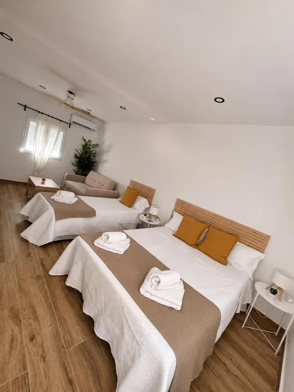 Habitación Triple — Hostal Palma Hermosa