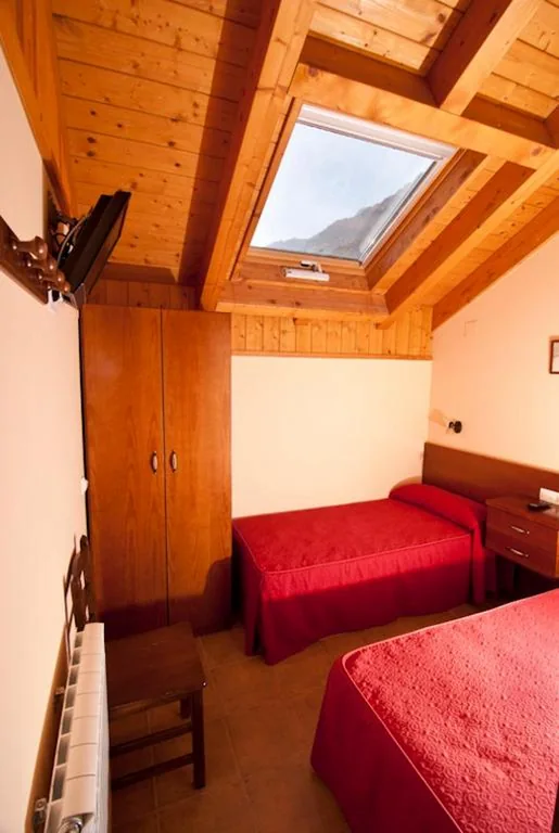 Quarto Quádruplo — Hostal Parque Natural