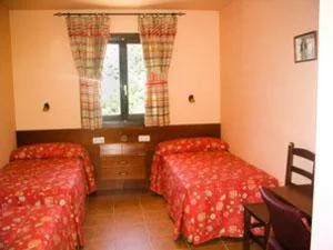 Quarto Triplo — Hostal Parque Natural