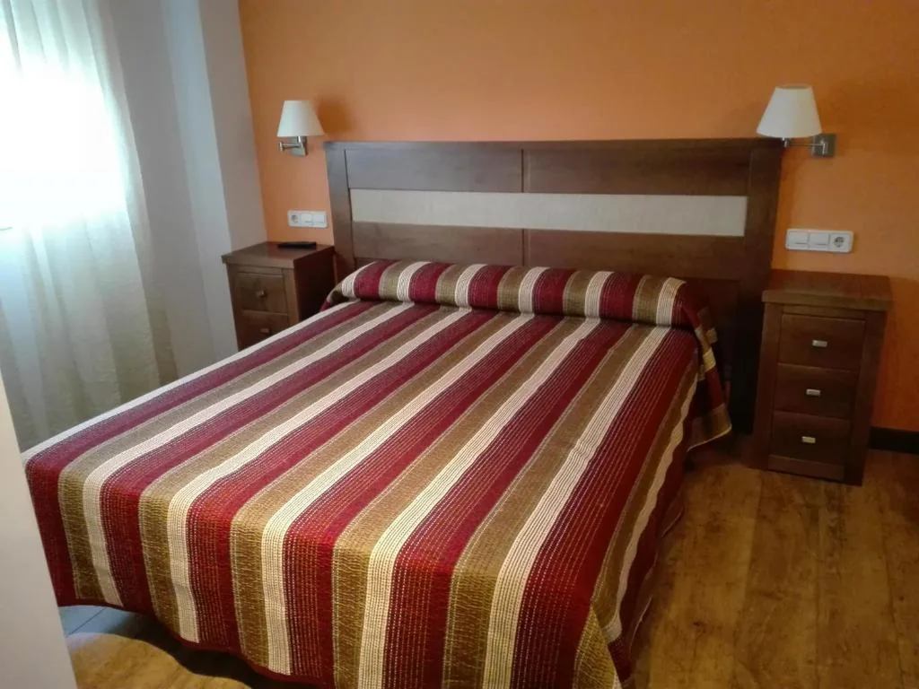 Habitación Deluxe - 1 cama grande — Hostal Patrón