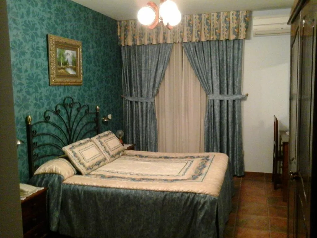 Suite Deluxe con bañera de hidromasaje — Hostal Piñera