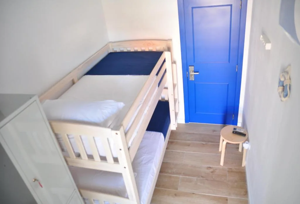 Economy Double Room - 2 Beds — Hostal Porto Mar