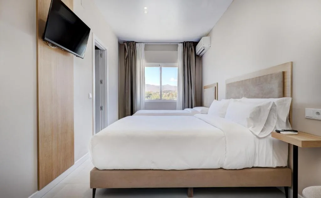Habitación Familiar — Hostal Puerta Almar