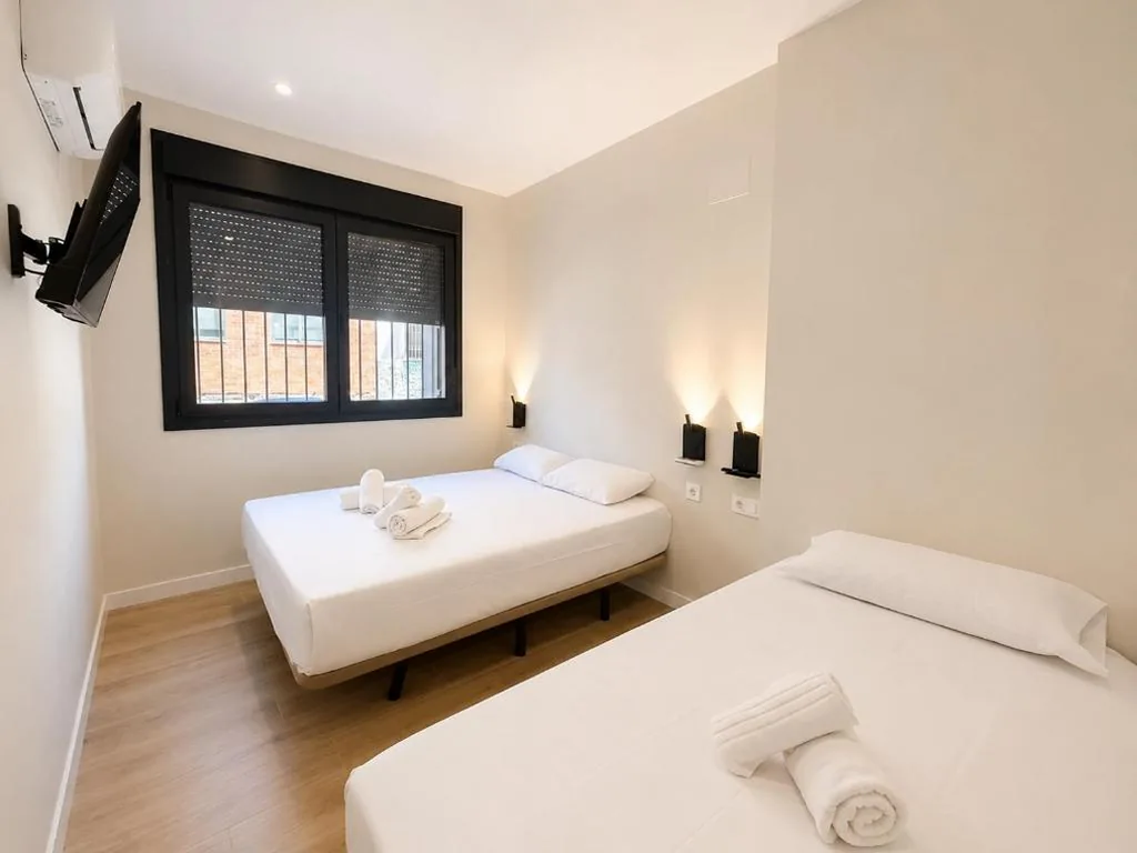 Driepersoonskamer — Hostal Ramon y Cajal
