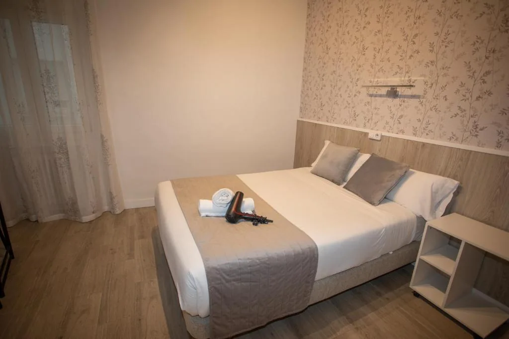 Habitación Triple — Hostal Residencia Avenida