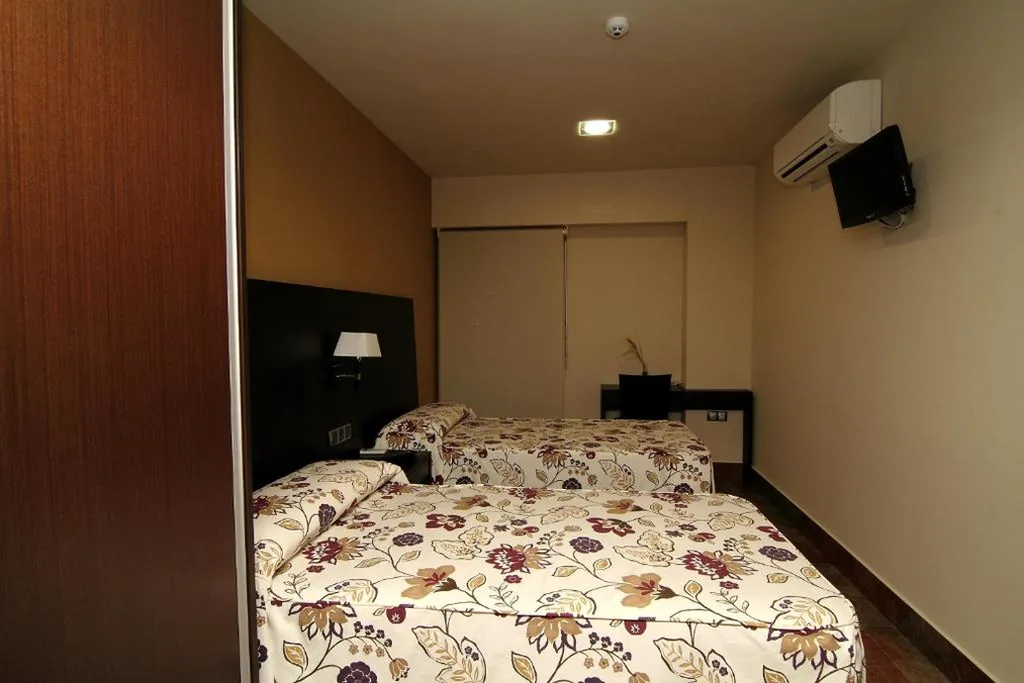 ダブルルーム（シングルベッド1台または2台） — Hostal Restaurante La Bartola