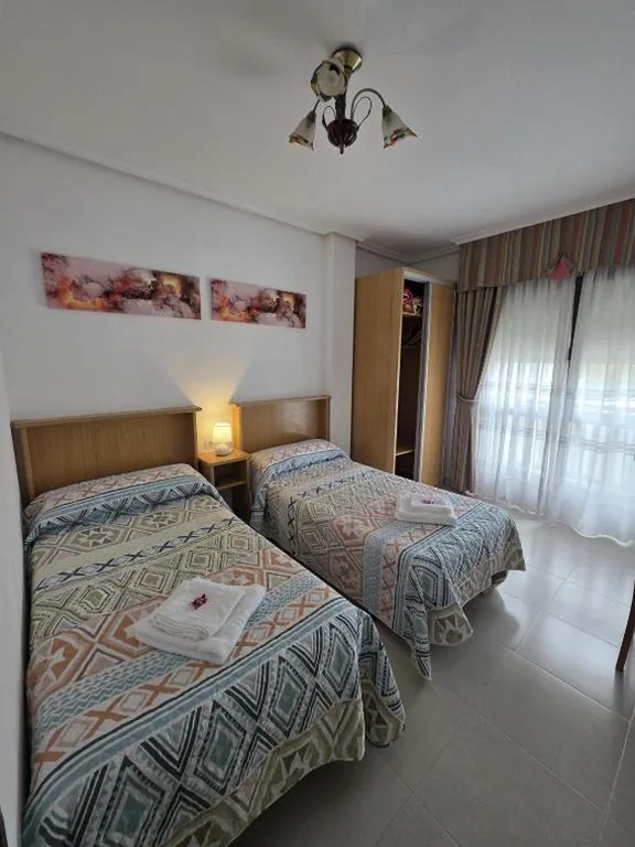 Tweepersoonskamer met 2 bedden — Hostal Restaurante Piedra