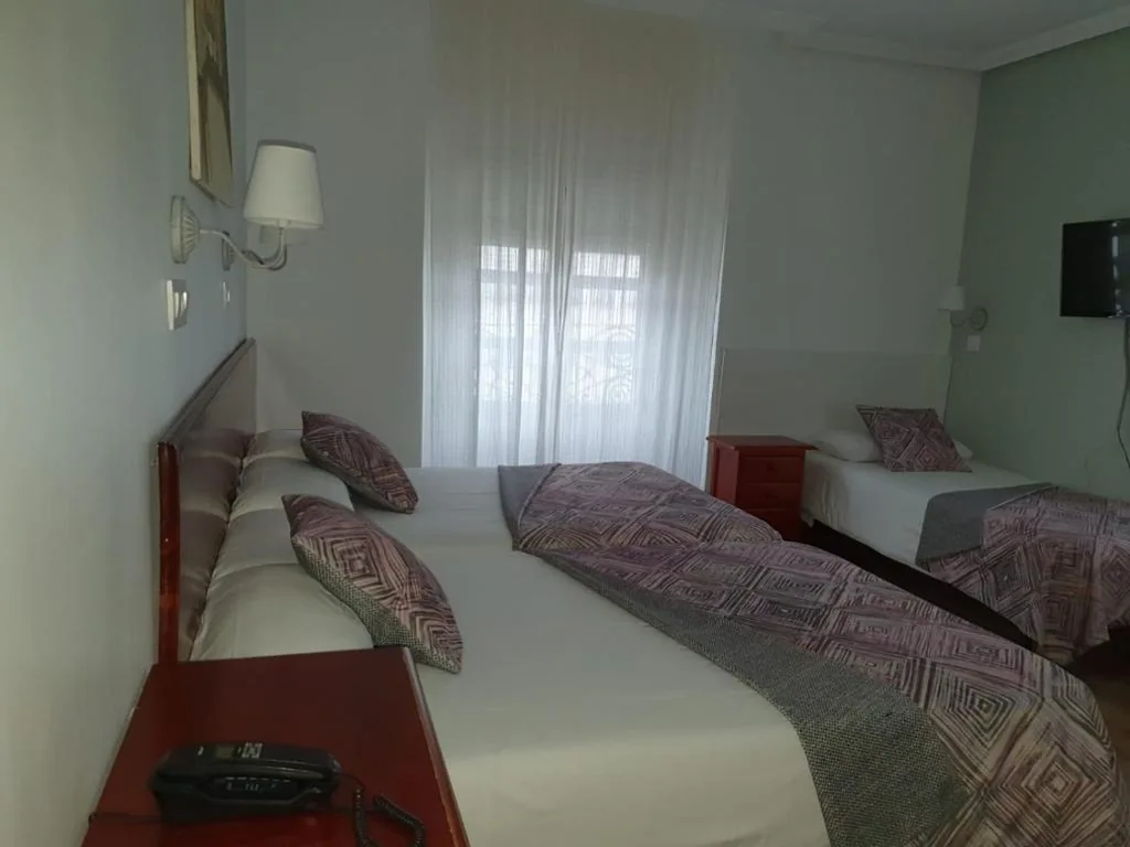 Camera tripla — Hostal Riesco