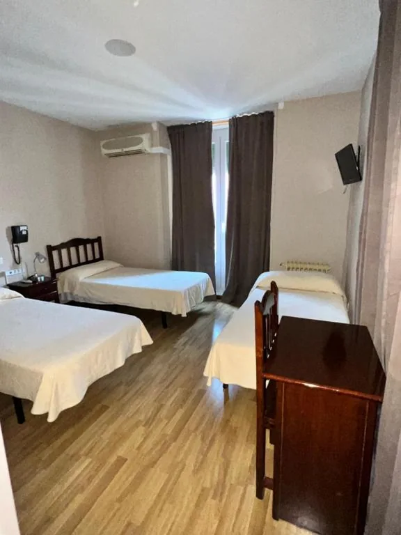 Quarto Triplo — Hostal Río Paraná