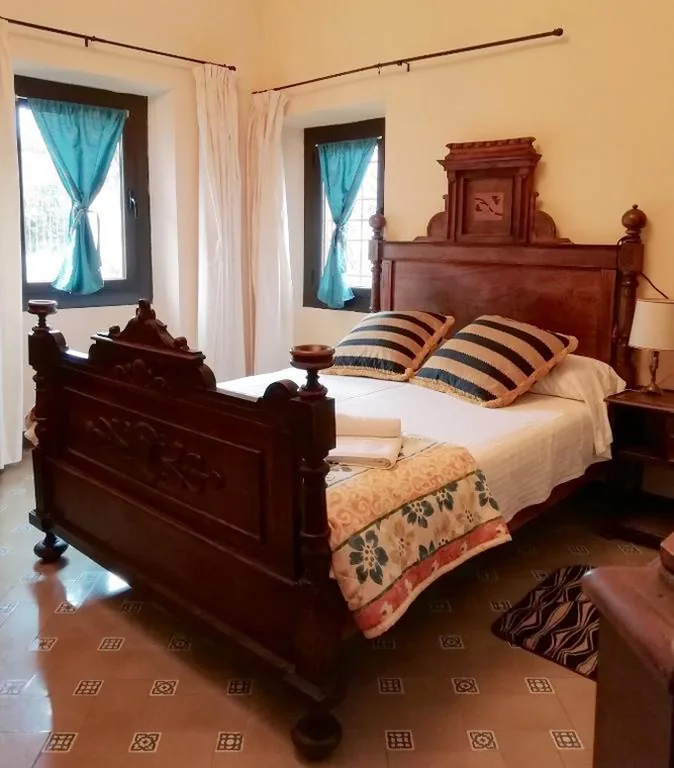 Chambre Quadruple avec baignoire — Hostal Rural Mas Blanc
