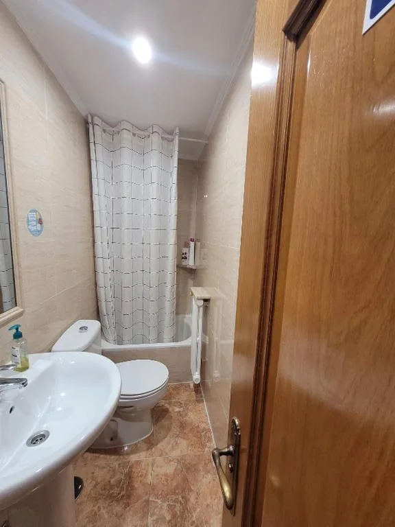 Triple Room with Shared Bathroom — Hostal San Felix