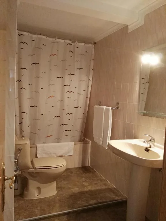 Triple Room with Private Bathroom — Hostal San Felix