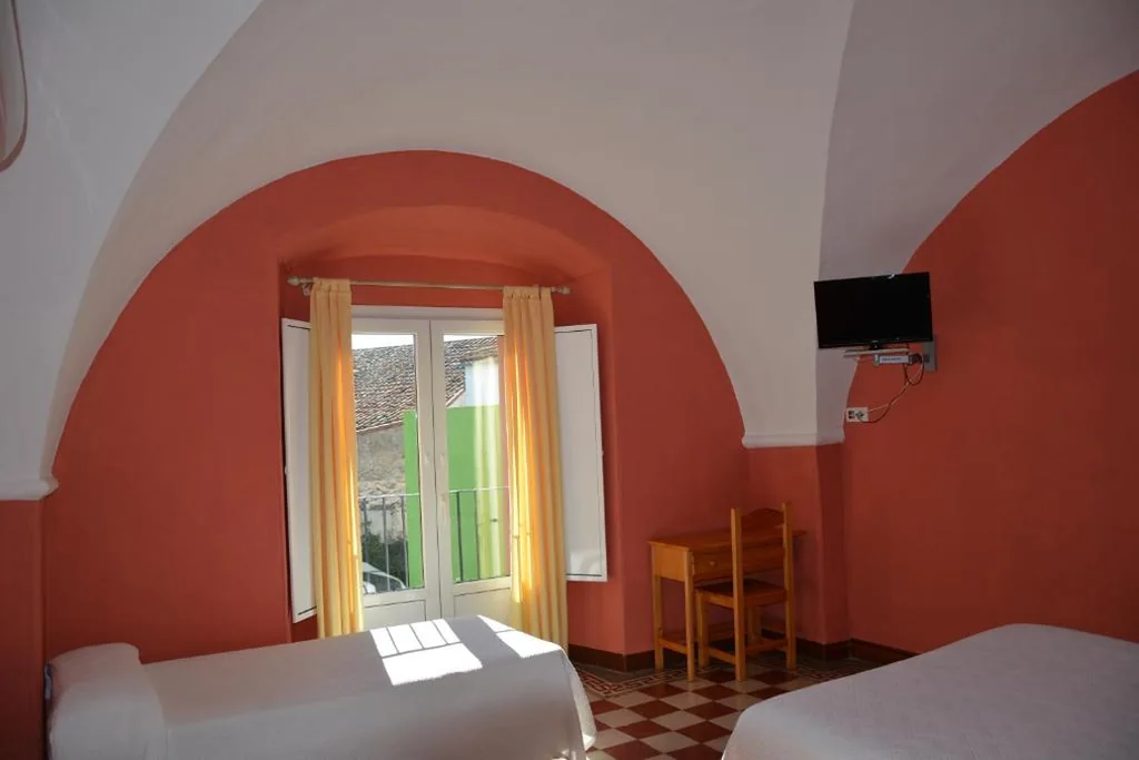 Dreibettzimmer — Hostal San Miguel