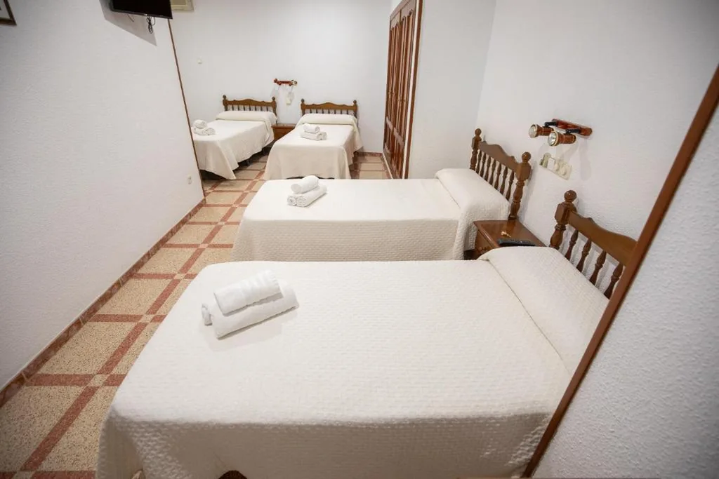 Habitación cuádruple — Hostal San Poul