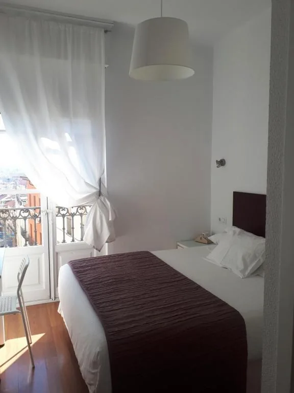 Habitación Individual con balcón — Hostal Santa Isabel