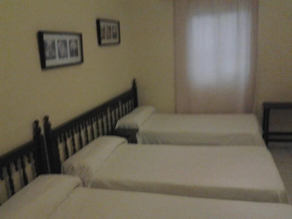 Camera quadrupla — Hostal Sierpes