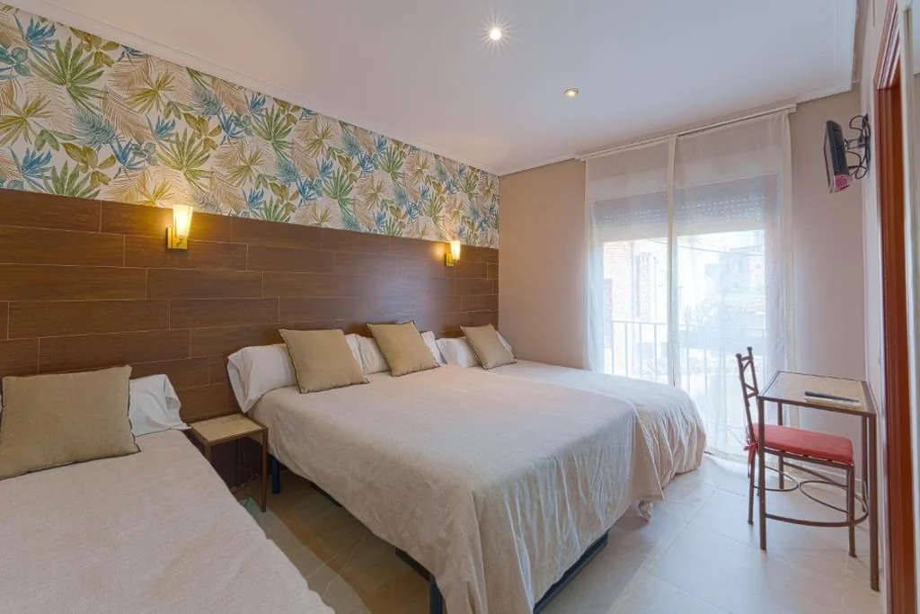 Chambre quadruple Confort — Hostal Sol