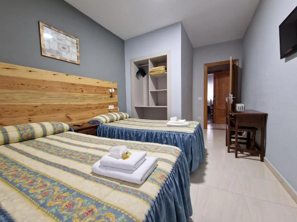 Habitación Triple — Hostal Soto