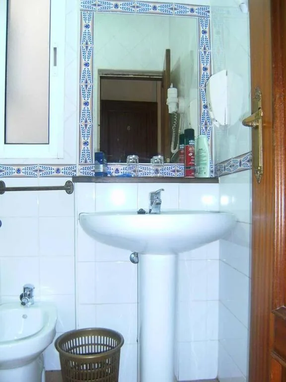 Quarto Triplo — Hostal Suárez