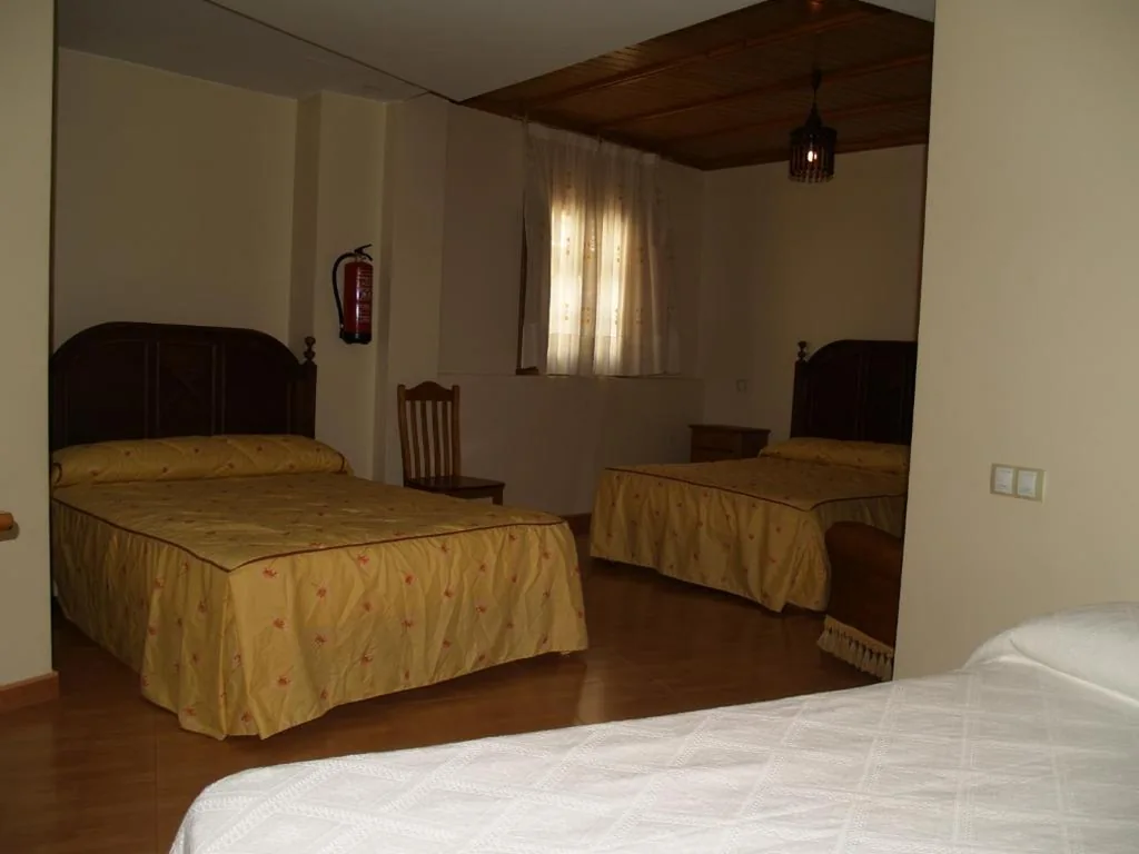 Quarto Quádruplo — Hostal Tribal