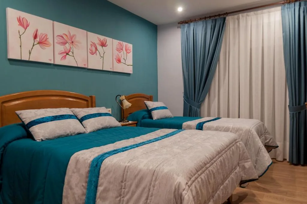 Quarto Triplo — Hostal Tribal