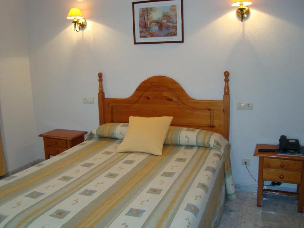 Habitación Individual — Hostal Universal